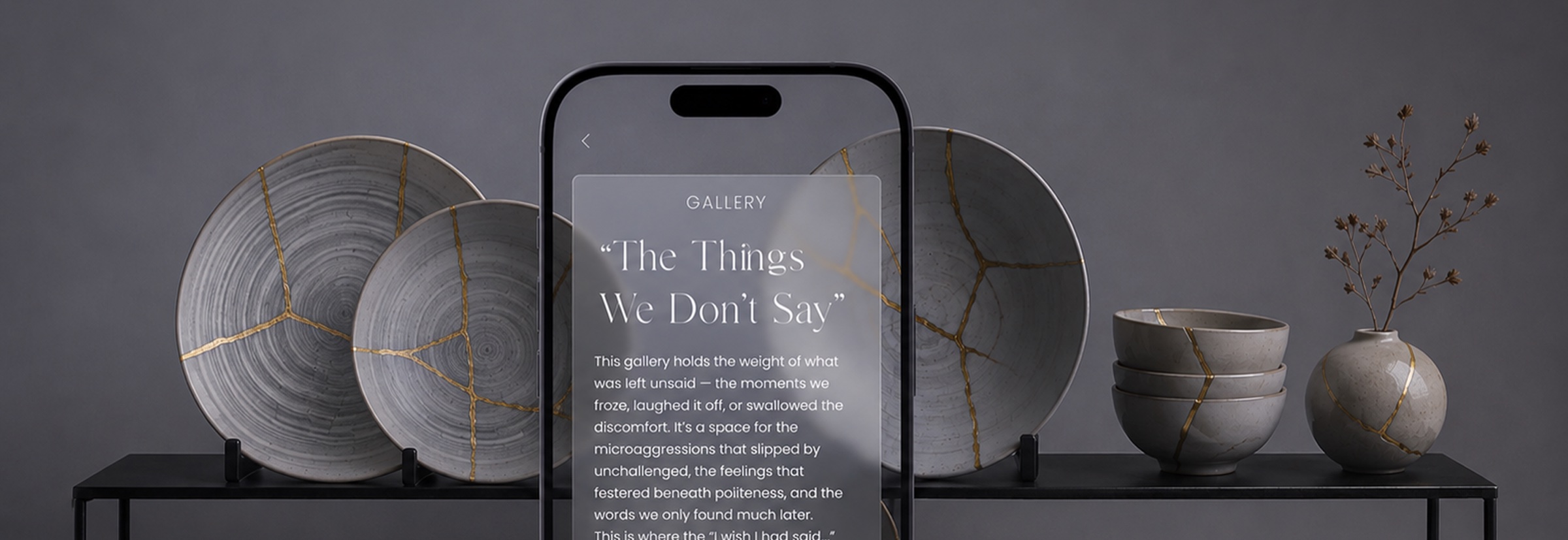 Kintsugi-repaired ceramics beside a phone showing the seam gallery